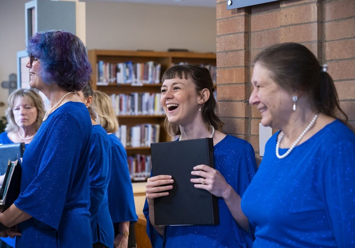 Contact South Hills Chorale - women practicing
